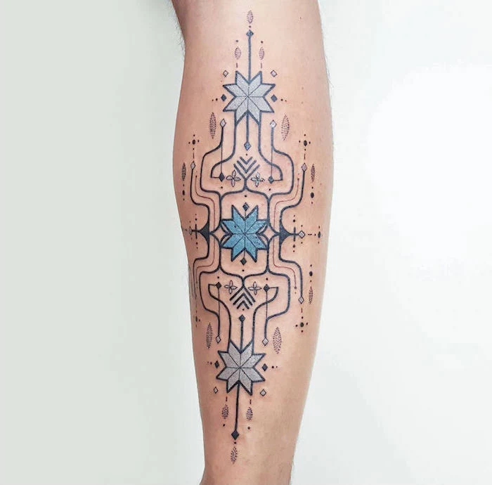 blue geometrical flowers connected with other geometrical shapes meaningful tattoos for women back of leg tattoo